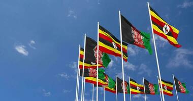 Afghanistan and Uganda Flags Waving Together in the Sky, Seamless Loop in Wind, Space on Left Side for Design or Information, 3D Rendering video