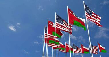 United States and Oman Flags Waving Together in the Sky, Seamless Loop in Wind, Space on Left Side for Design or Information, 3D Rendering video