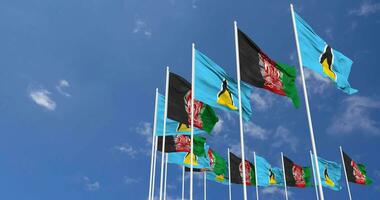 Afghanistan and Saint Lucia Flags Waving Together in the Sky, Seamless Loop in Wind, Space on Left Side for Design or Information, 3D Rendering video