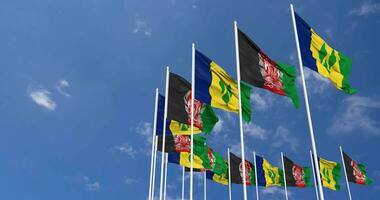 Afghanistan and Saint Vincent and the Grenadines Flags Waving Together in the Sky, Seamless Loop in Wind, Space on Left Side for Design or Information, 3D Rendering video