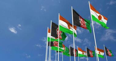 Afeganistão e Níger bandeiras acenando juntos dentro a céu, desatado ciclo dentro vento, espaço em esquerda lado para Projeto ou Informação, 3d Renderização video