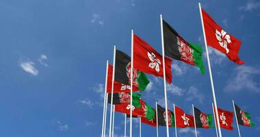Afghanistan and Hong Kong Flags Waving Together in the Sky, Seamless Loop in Wind, Space on Left Side for Design or Information, 3D Rendering video