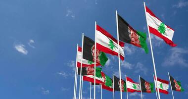 Afghanistan and Lebanon Flags Waving Together in the Sky, Seamless Loop in Wind, Space on Left Side for Design or Information, 3D Rendering video