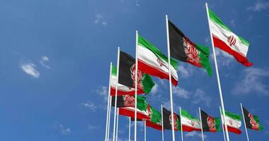 Afghanistan and Iran Flags Waving Together in the Sky, Seamless Loop in Wind, Space on Left Side for Design or Information, 3D Rendering video