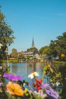 Water canal surrounding the historic centre of Zwolle in the east of the Netherlands. Transportation by river during the day photo