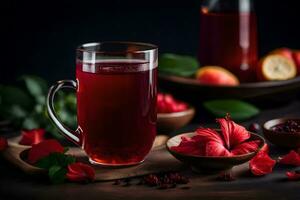 ai generado rojo té en un vaso jarra con rojo flores y hojas foto