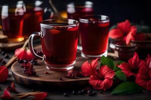 AI generated red tea with flowers and spices on a wooden table photo