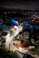 View on roofs in the city of Dalat. Da Lat and the surrounding area is a popular tourist destination of Asia. City with fogs and mountains photo