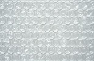 The texture of the packaging bubble film. Abstract background. Close-up. Selective focus. photo