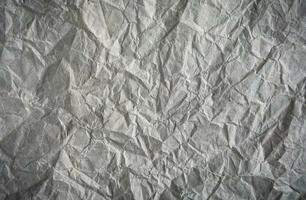 Crumpled gray paper. Abstract background. Banner. Copy space. Selective focus. photo