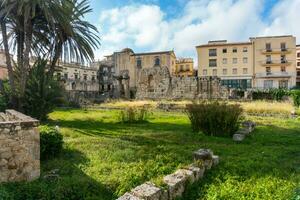 Syracuse, Italy-May 9, 2022-View of the beautiful temple of Apollo,  the oldest in Sicily during a sunny day photo