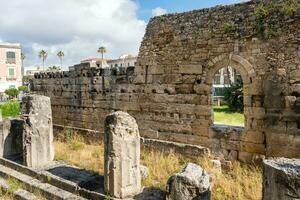 Syracuse, Italy-May 9, 2022-View of the beautiful temple of Apollo,  the oldest in Sicily during a sunny day photo