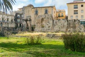 Syracuse, Italy-May 9, 2022-View of the beautiful temple of Apollo,  the oldest in Sicily during a sunny day photo
