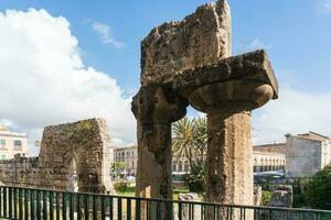 Syracuse, Italy-May 9, 2022-View of the beautiful temple of Apollo,  the oldest in Sicily during a sunny day photo