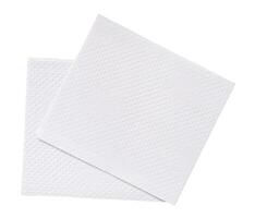 Two folded pieces of white tissue paper or napkin in stack tidily prepared for use in toilet or restroom isolated on white background with clipping path photo