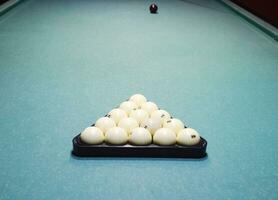 Billiards, billiard table, balls in the triangle. Construction o photo