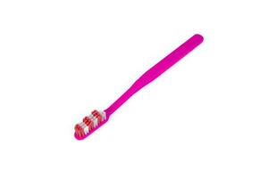 Pink toothbrush on white background photo