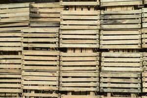 Wooden boxes stacked together. Warehouse empty wooden containers photo