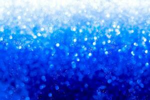 Blue Sparkling Glitter bokeh Background. photo