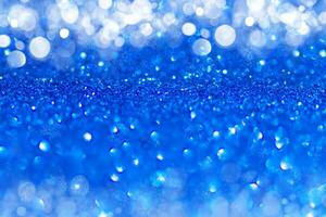 Blue Sparkling Glitter bokeh Background. photo