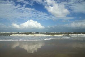 Waves and wind in the summer. photo