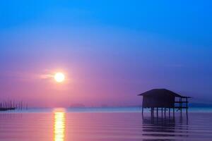 Sunset sky on the lake with soft light in south of Thailand. photo