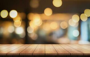 Empty wooden table top with lights bokeh on blur restaurant background. photo