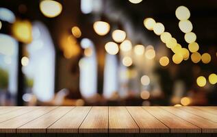 Empty wooden table top with lights bokeh on blur restaurant background. photo