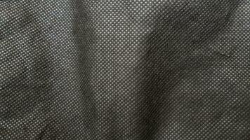 antecedentes con negro paño textura foto