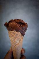 Chocolate ice cream in wafer cone photo