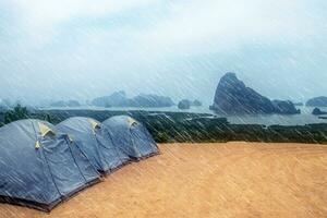 Tent with tropical landscape in the raining day. photo