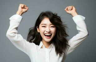 AI generated a young asian woman who is excited for winning a competition against another person, photo