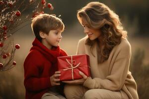 ai generado un mujer sostiene un grande rojo regalo caja con pequeño chico en un árbol, foto
