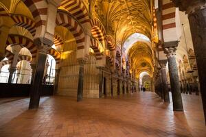 La Mezquita Cathedral in Cordoba, Spain. The cathedral was built inside of the former Great Mosque. photo