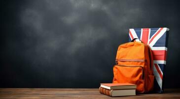 AI generated an orange backpack sitting on a table with book and Union flag on it photo