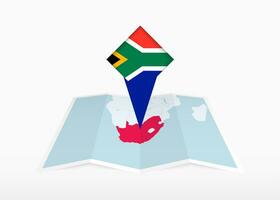 South Africa is depicted on a folded paper map and pinned location marker with flag of South Africa. vector