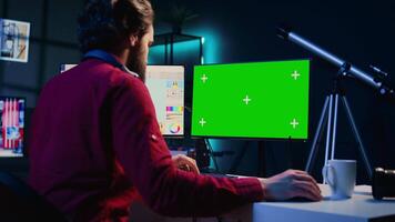 Photo editor using mockup PC monitor to color correct photographs in creative media agency. Photographer selecting best pictures for editorial content with isolated screen computer display video