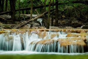 Small waterfall in the forest. photo