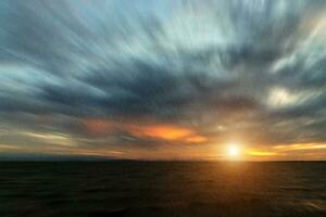 Cloudscape scene and rainfall with sunlight. photo