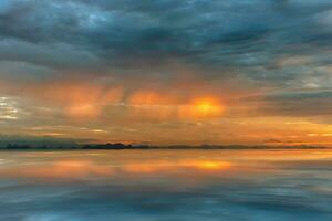 Cloudscape scene and rainfall with sunlight. photo