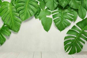 AI generated Empty wall background with tropical leaves. Pro Photo