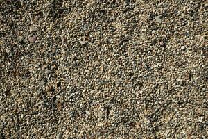 Close-up shot with gravel stones, pebbles as a background. photo