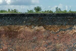 Layers of road with soil and rock. photo