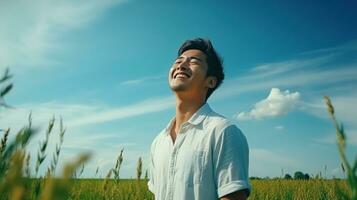 AI generated Calm Happy Smiling Asian Man with Closed Eyes on the Fields. Free, Peace, Beautiful Moment Concept photo