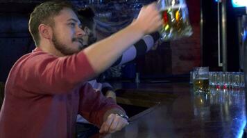 Man tastes beer at the pub video