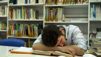 Guy sleeps at the library video