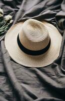 AI generated a straw hat, sunglasses and a straw bucket hat lying on a white blanket, photo