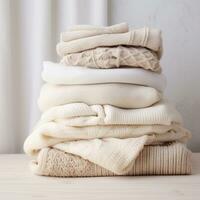 AI generated a stack of knit sweaters on an image background photo