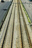 an overhead view of a train track with cars on it photo