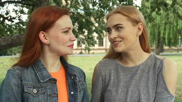 Two girls posing for a camera video